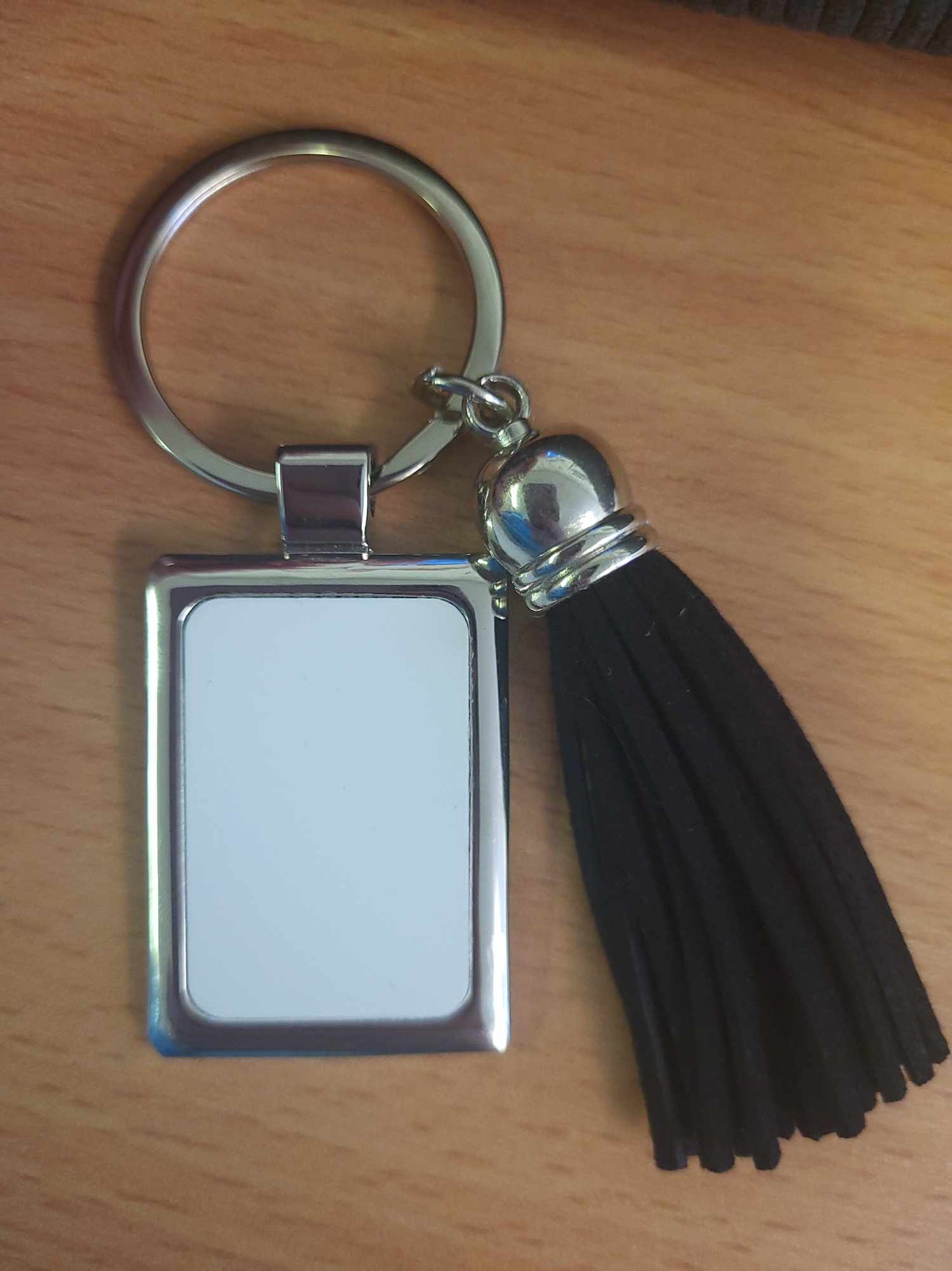 Chrome photo keyring with tassle